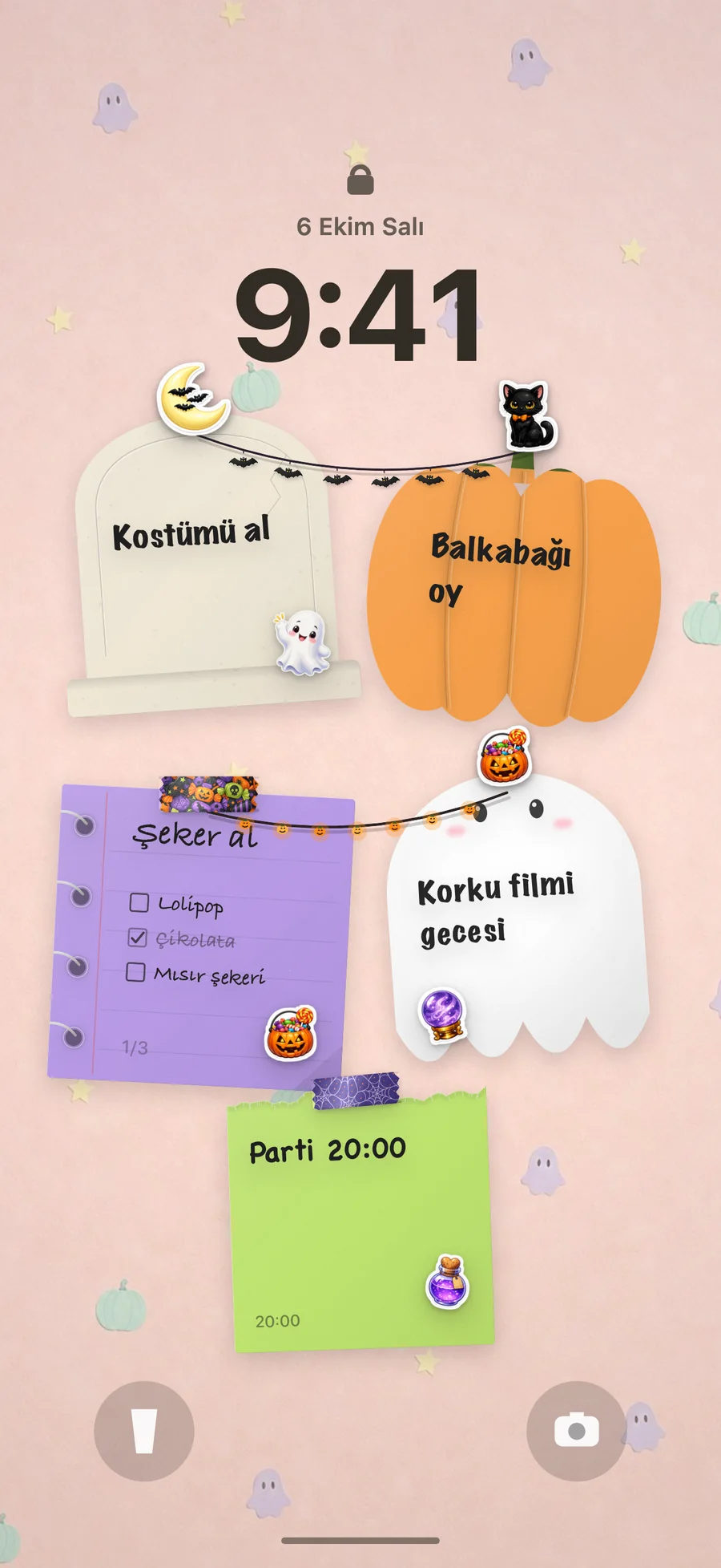 Aynı notlarla küçük hayaletli, pastel ve sevimli bir Cadılar Bayramı kilit ekranı