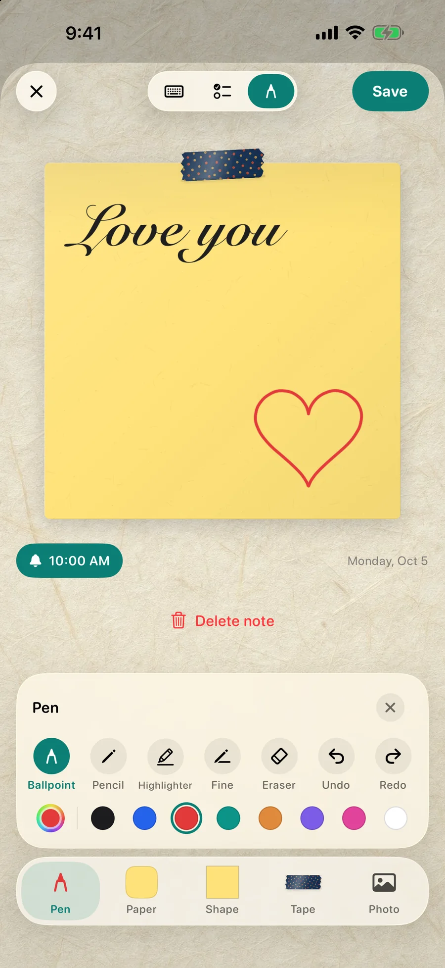A yellow note with “Love you” in calligraphy and a hand-drawn heart