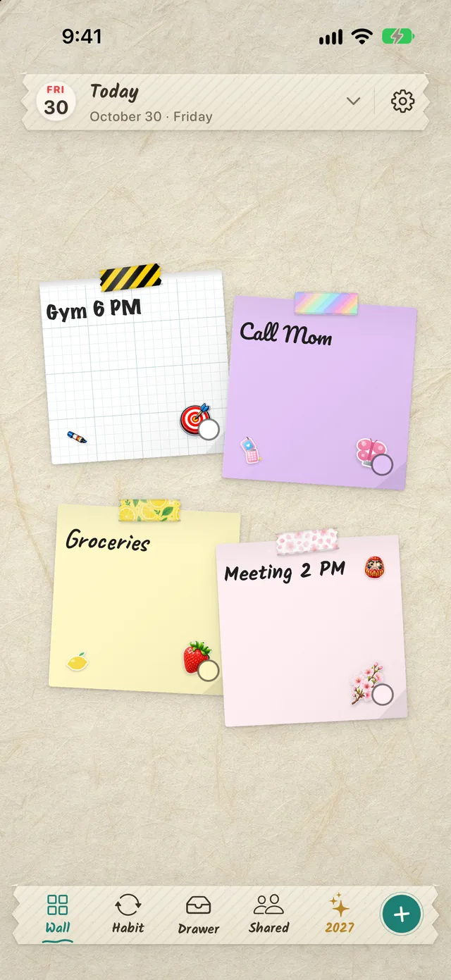 A wall in the DailyWall app with four sticky notes, washi tape and stickers