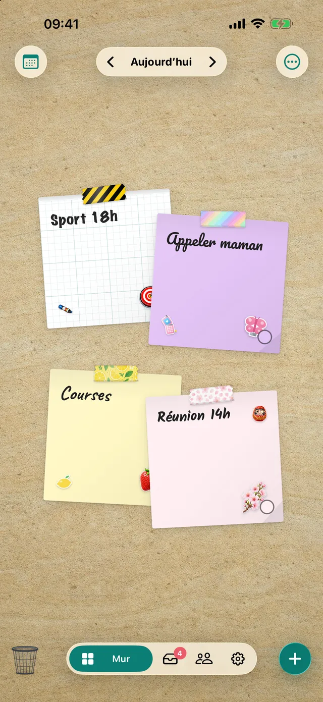 Un mur dans l’app DailyWall avec quatre post-it, du masking tape et des stickers